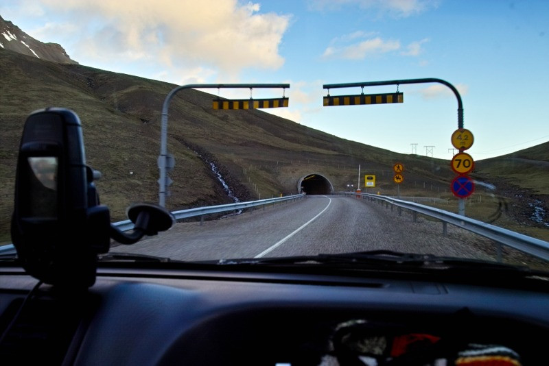Entrance to a tunnel in Iceland from the windshield of a vehicle