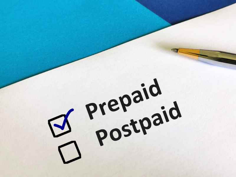 Prepaid option selected on a form next to Postpaid Form with a checked checkbox for
